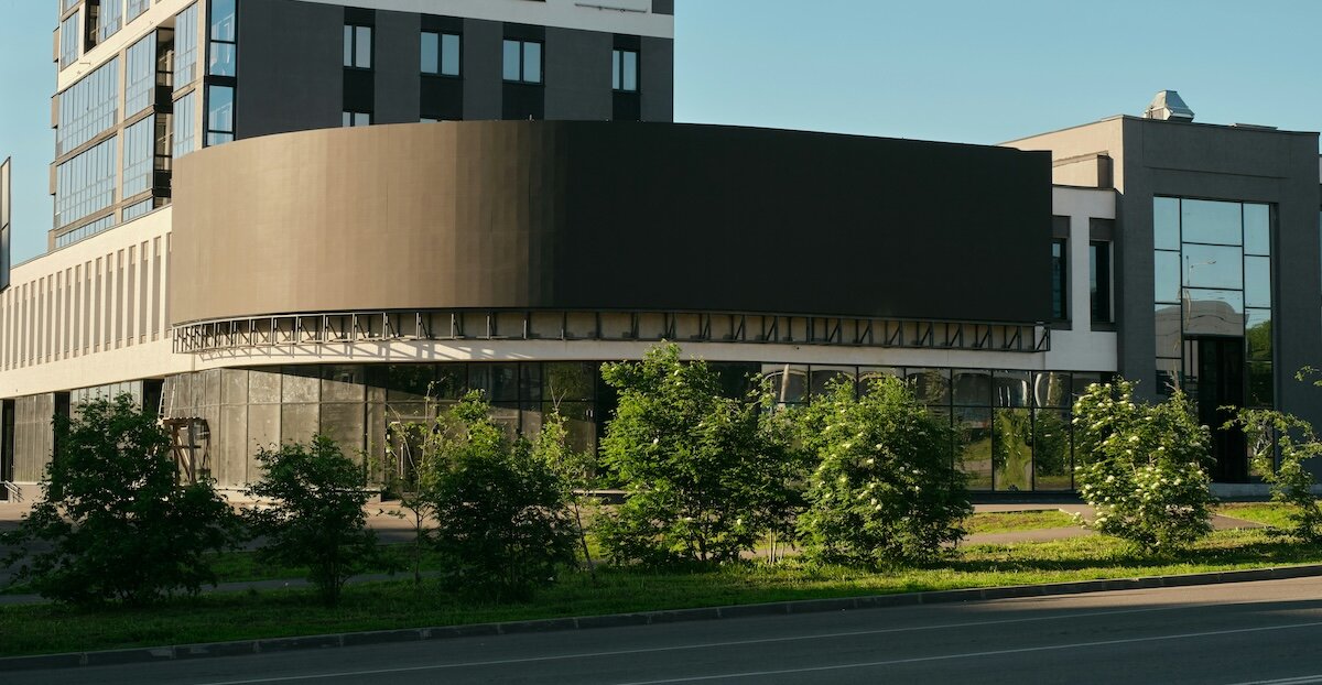 a redeveloped office building with curving architecture