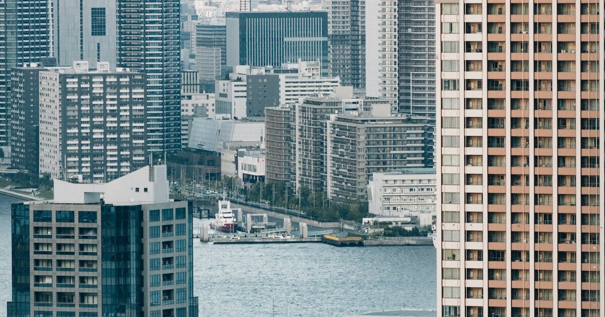 new york city as seen between two commercial real estate buildings