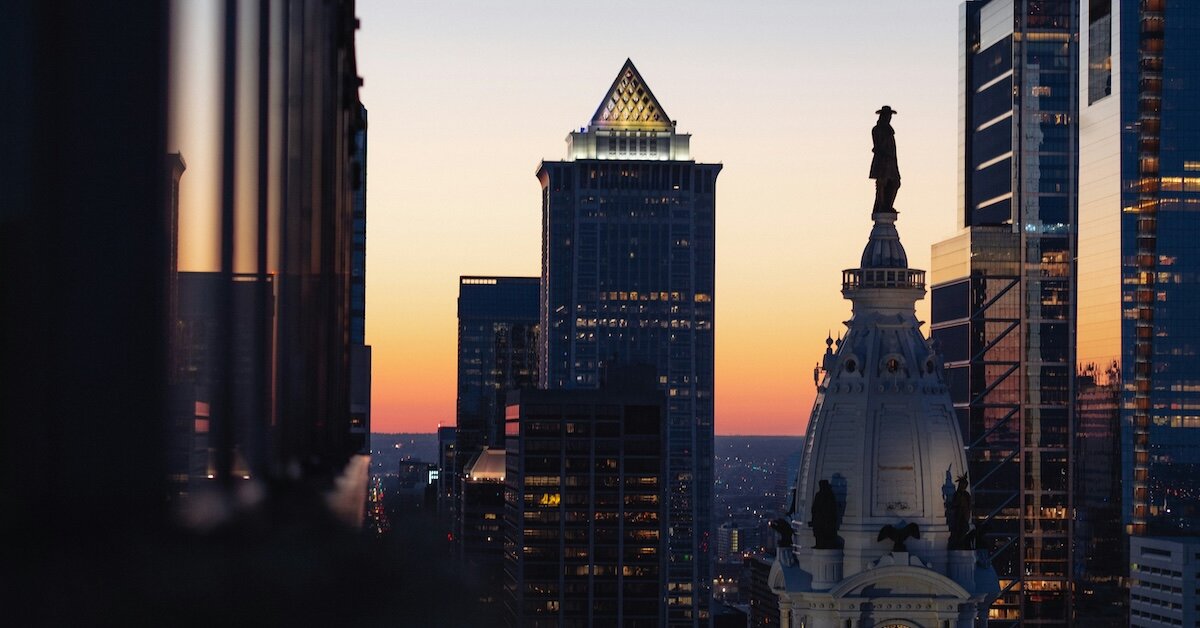 tall buildings in Philadelphia in silhouette at sunset