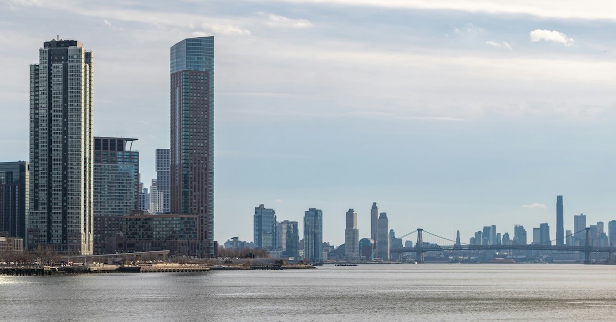 New York City's skyline in the distance across Hudson River