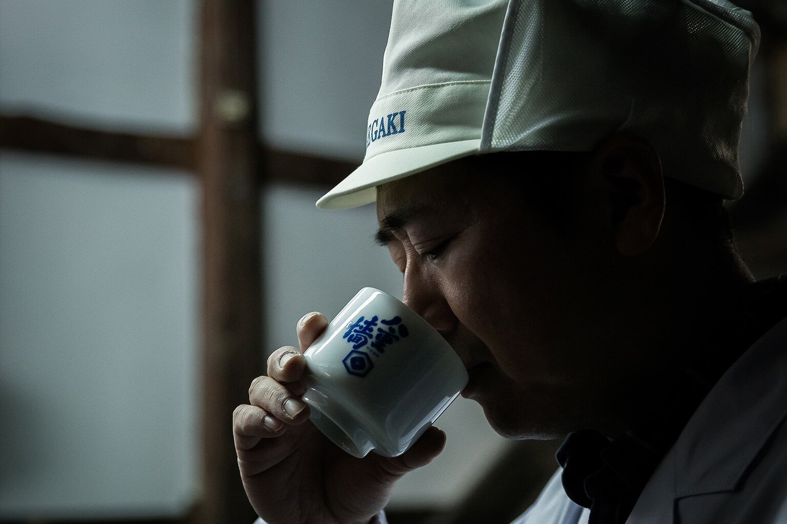 Man tasting sake