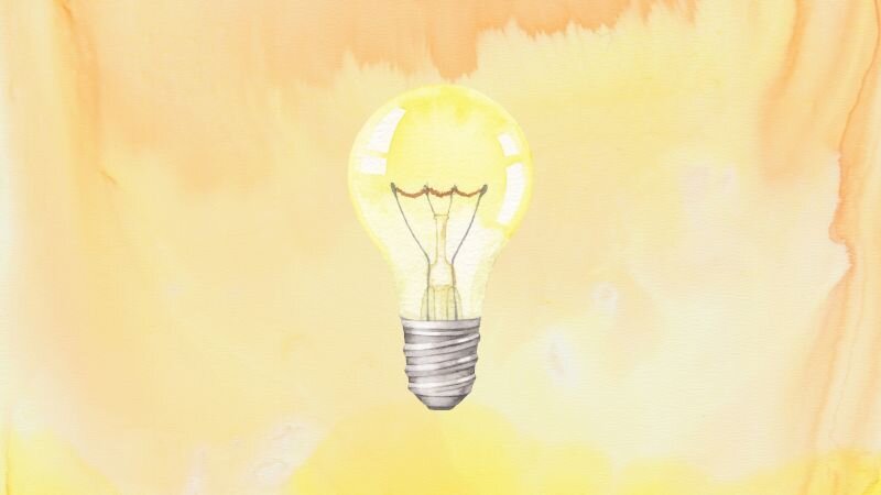 An illustration of a lightbulb on a watercolor background.