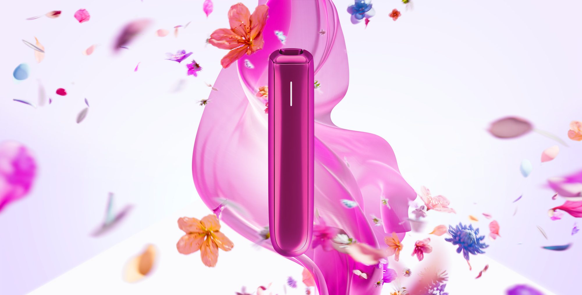 Ploom AURA Fuchsia Flair device surrounded by flowers and pink smoke