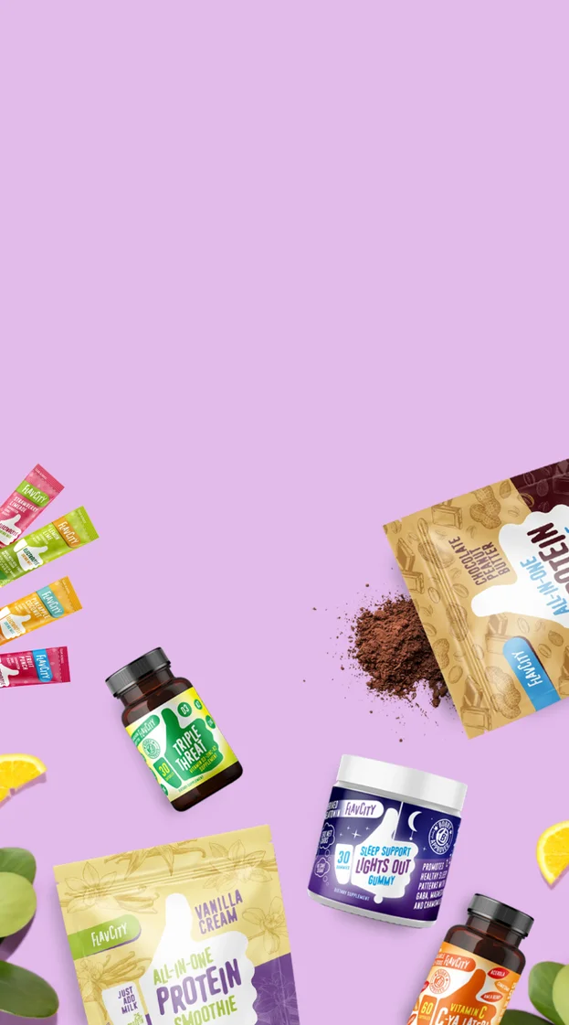 An assortment of Flav City products on a purple background with chocolate protein mix spilt out