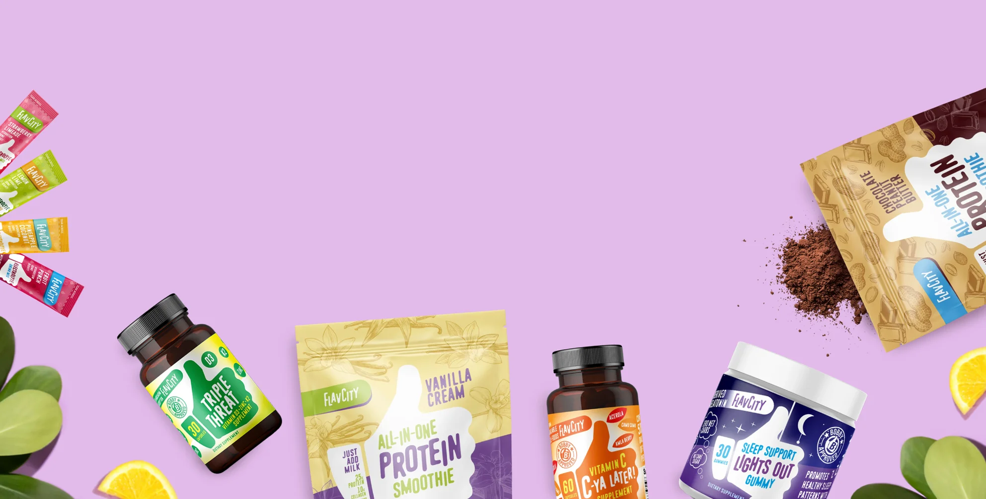 An assortment of Flav City products on a purple background with chocolate protein mix spilt out