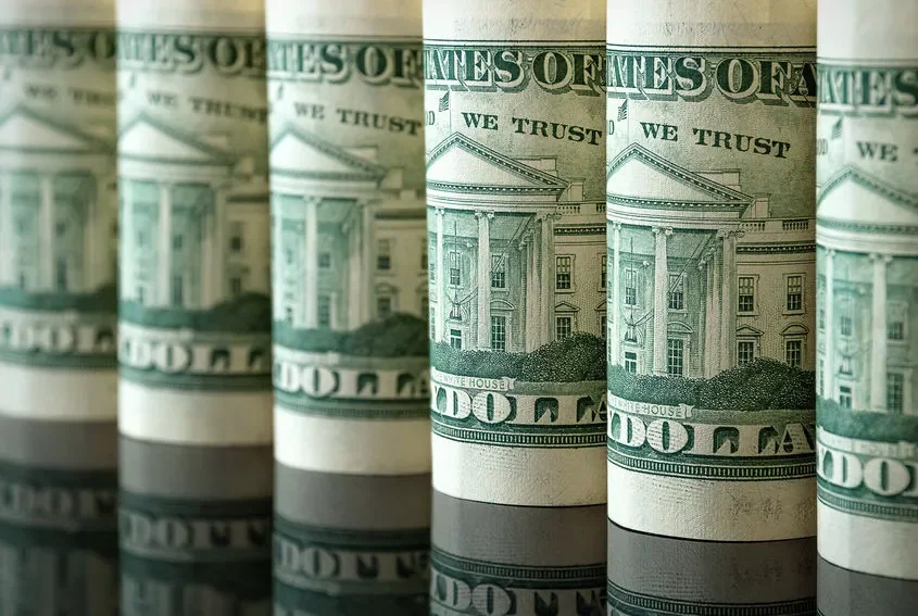 USDInd holds below 100 as markets brace for data-heavy week