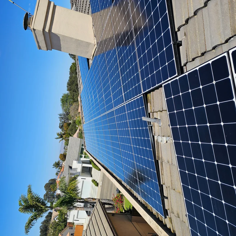 Residential solar panel array on a tiled roof