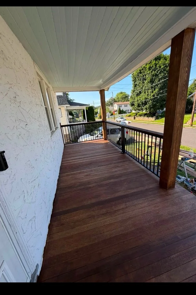 Covered Front Porch with Black Railing — Pennsylvania