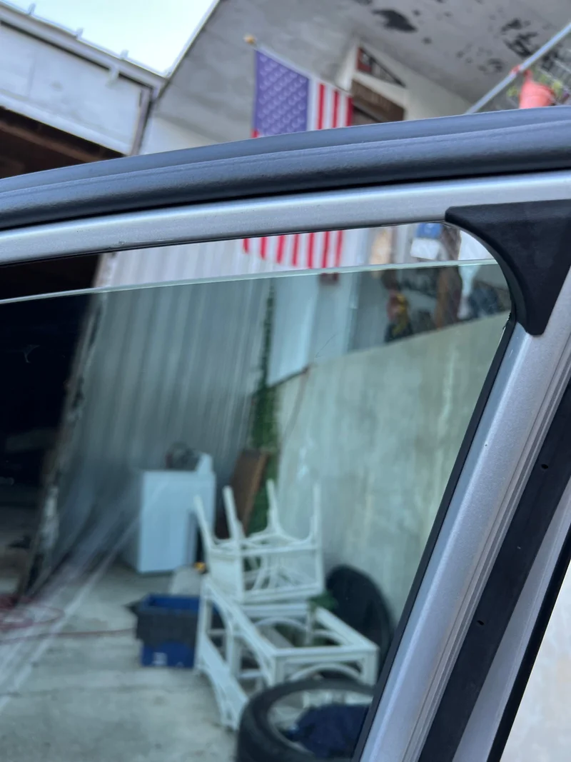 Freshly tinted vehicle door glass