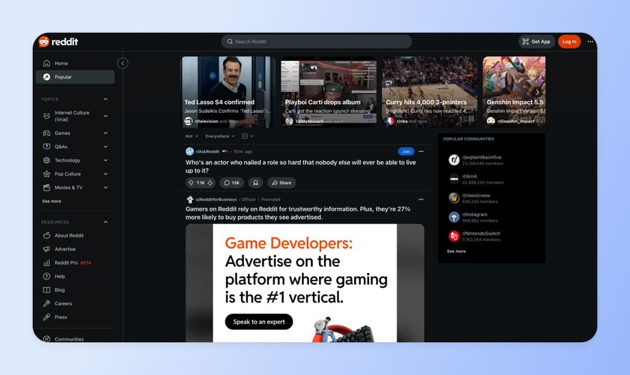 Screenshot of Reddit's desktop interface showing trending topics including "Ted Lasso S4 confirmed" and "Curry hits 4,000 3-pointers." The left sidebar shows categories like Internet Culture and Games, while the main feed displays posts and advertisements.