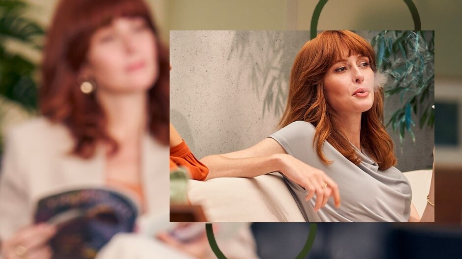 A woman blowing out smoke is visible in the picture.