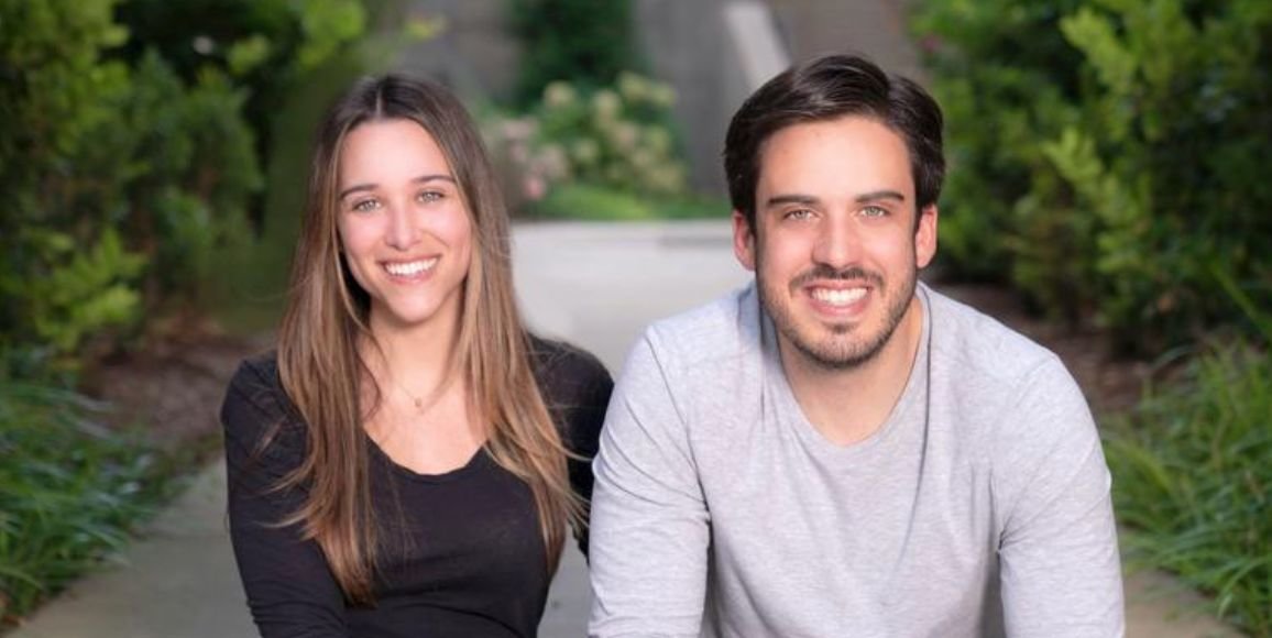 Bianca and Jonathan sit side by side