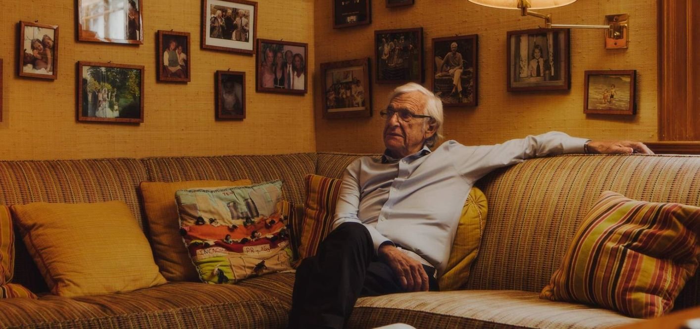 A man sits on a couch