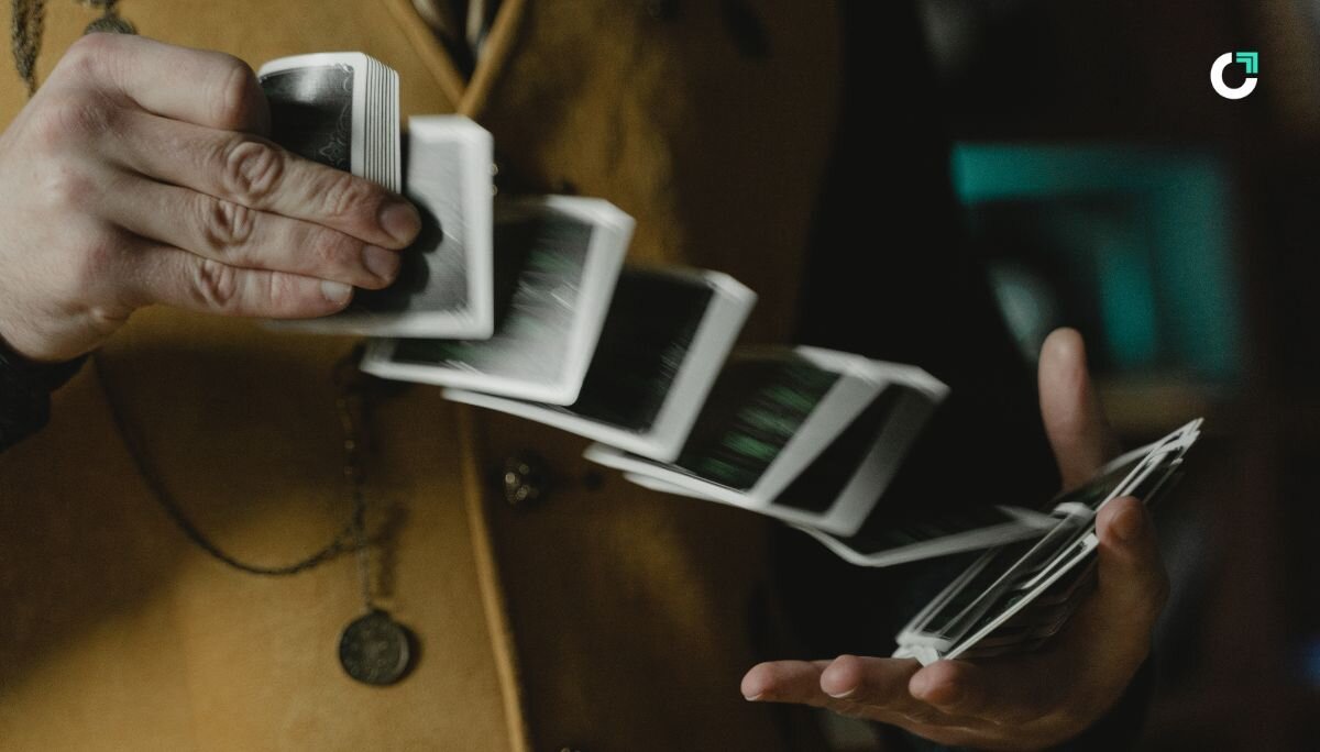 Person shuffling a deck of cards
