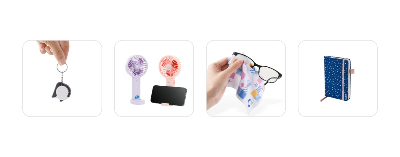 Useful but unique small business giveaway examples from Wayo: a customizable tape measure keychain, mini fan desk fan/phone holder, microfiber cloth, and hardcover notebook.
