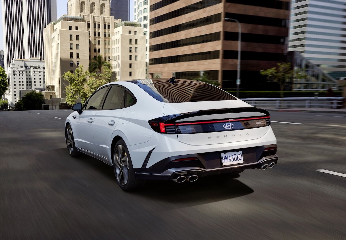 2027 Hyundai Sonata N Line white rear driving in city