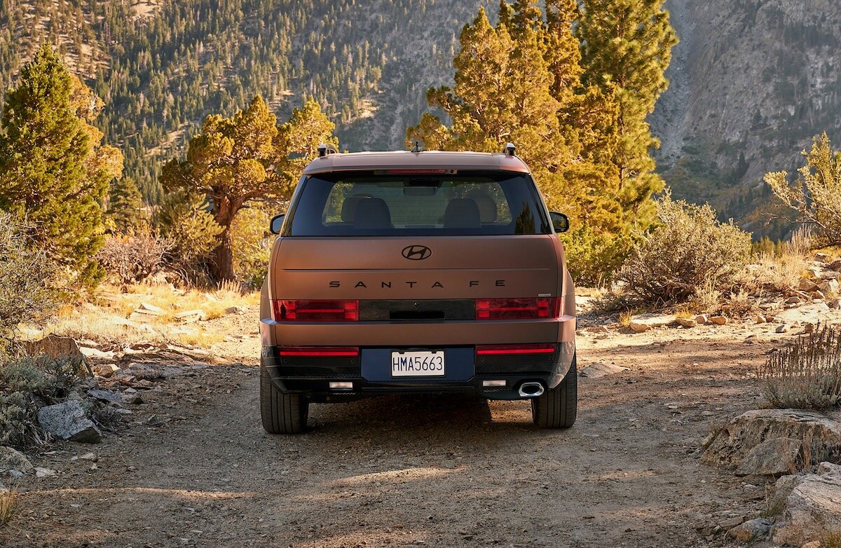 2027 Hyundai Santa Fe rear static parked on gravel