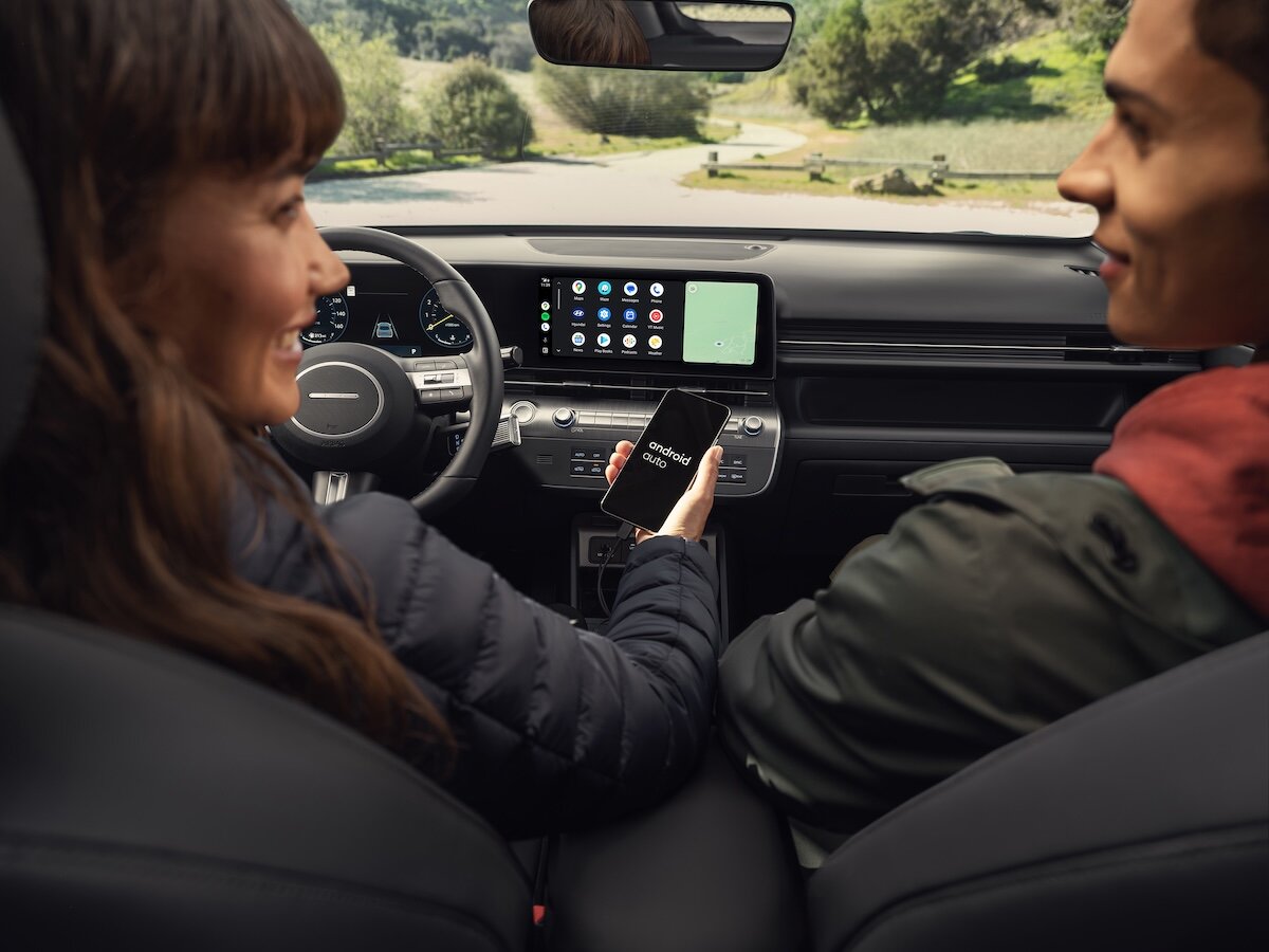 A car guru, happy to have purchased a car.