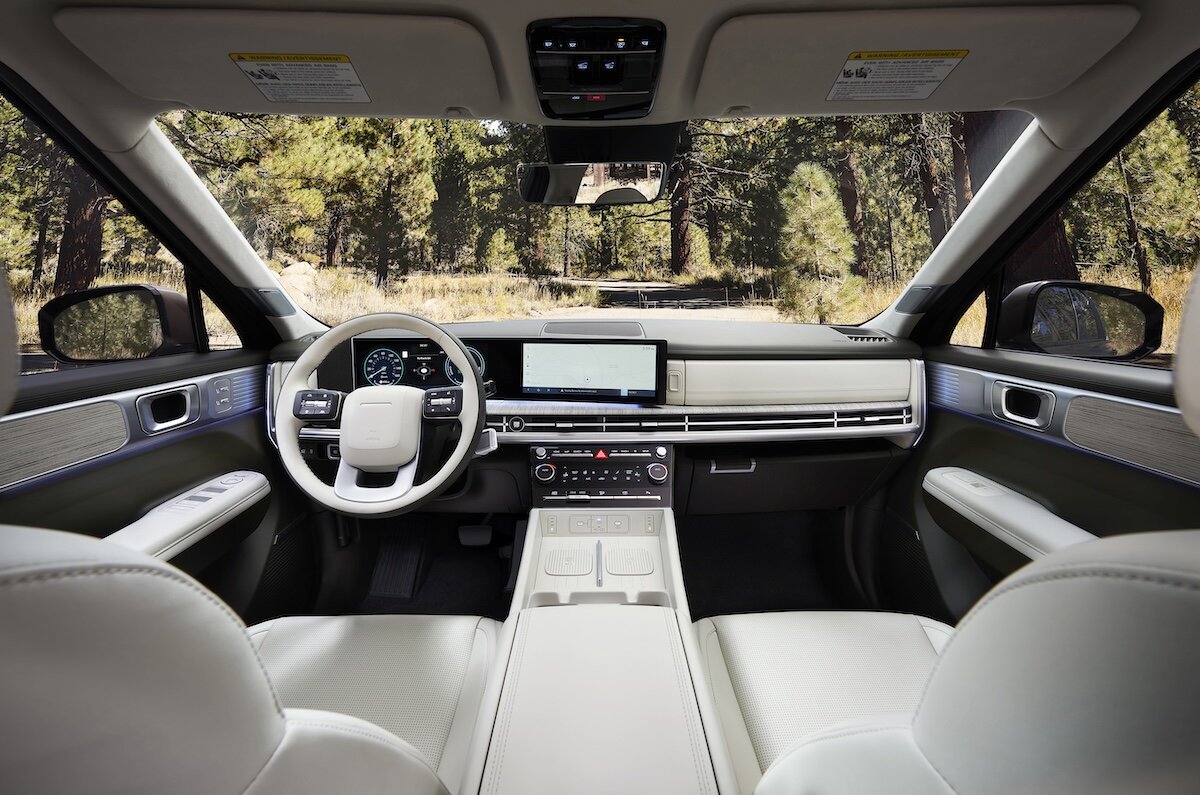 2027 Hyundai Santa Fe interior showing steering wheel and infotainment screen