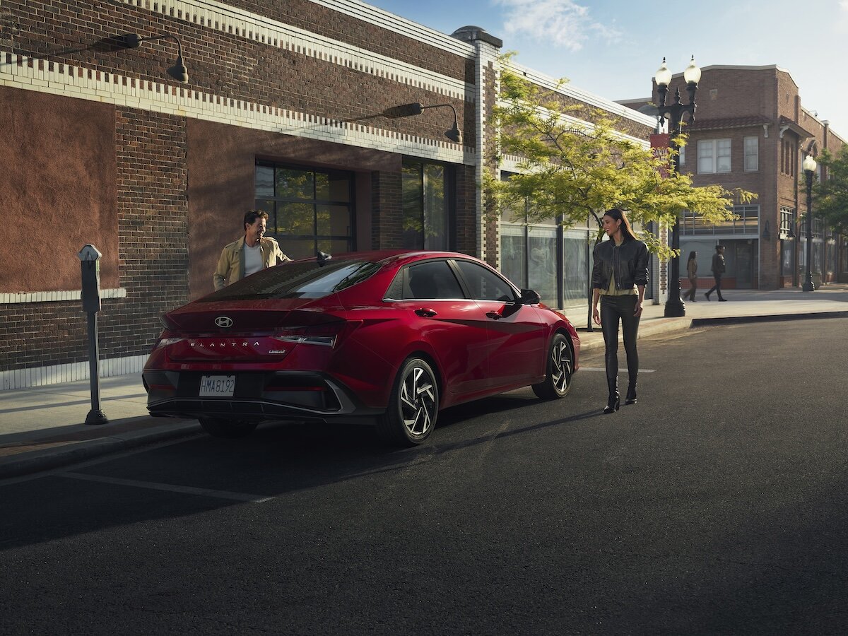 2026 Hyundai ELANTRA parked in city, man and woman getting in