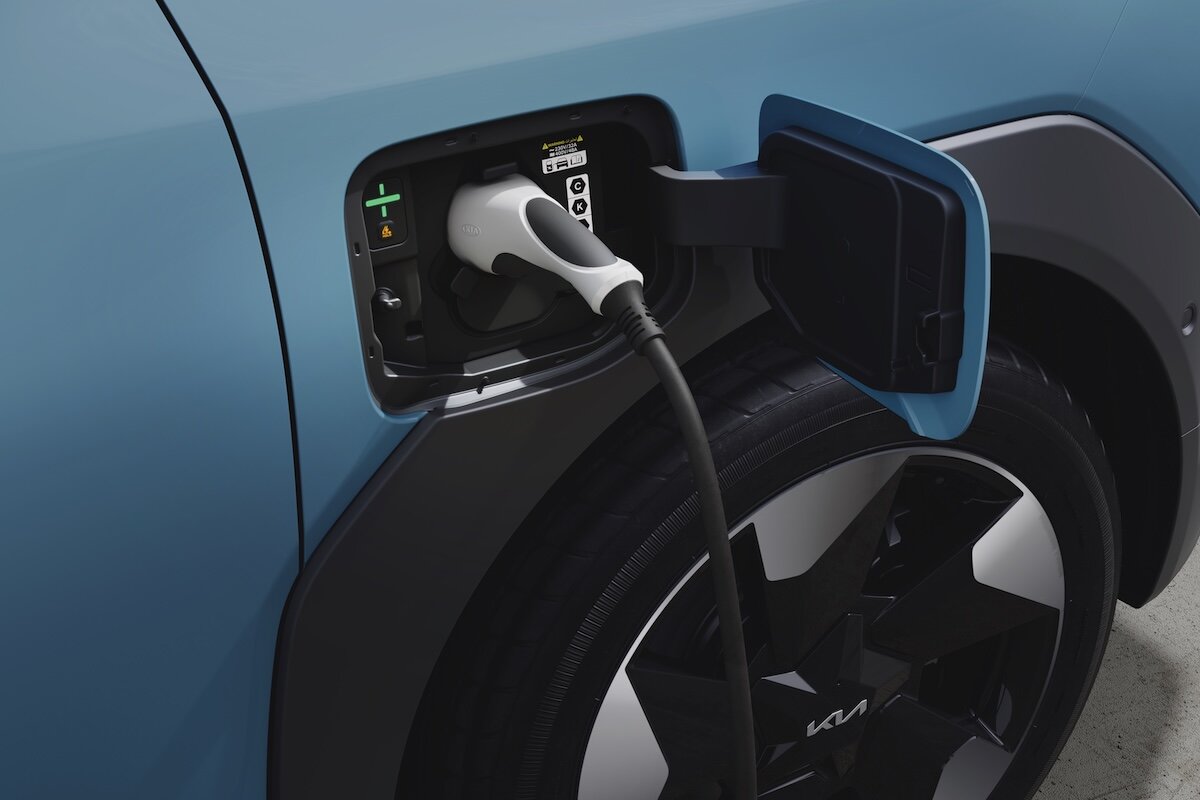 2026 Kia EV2 showing charging cable plugged in and charging the car