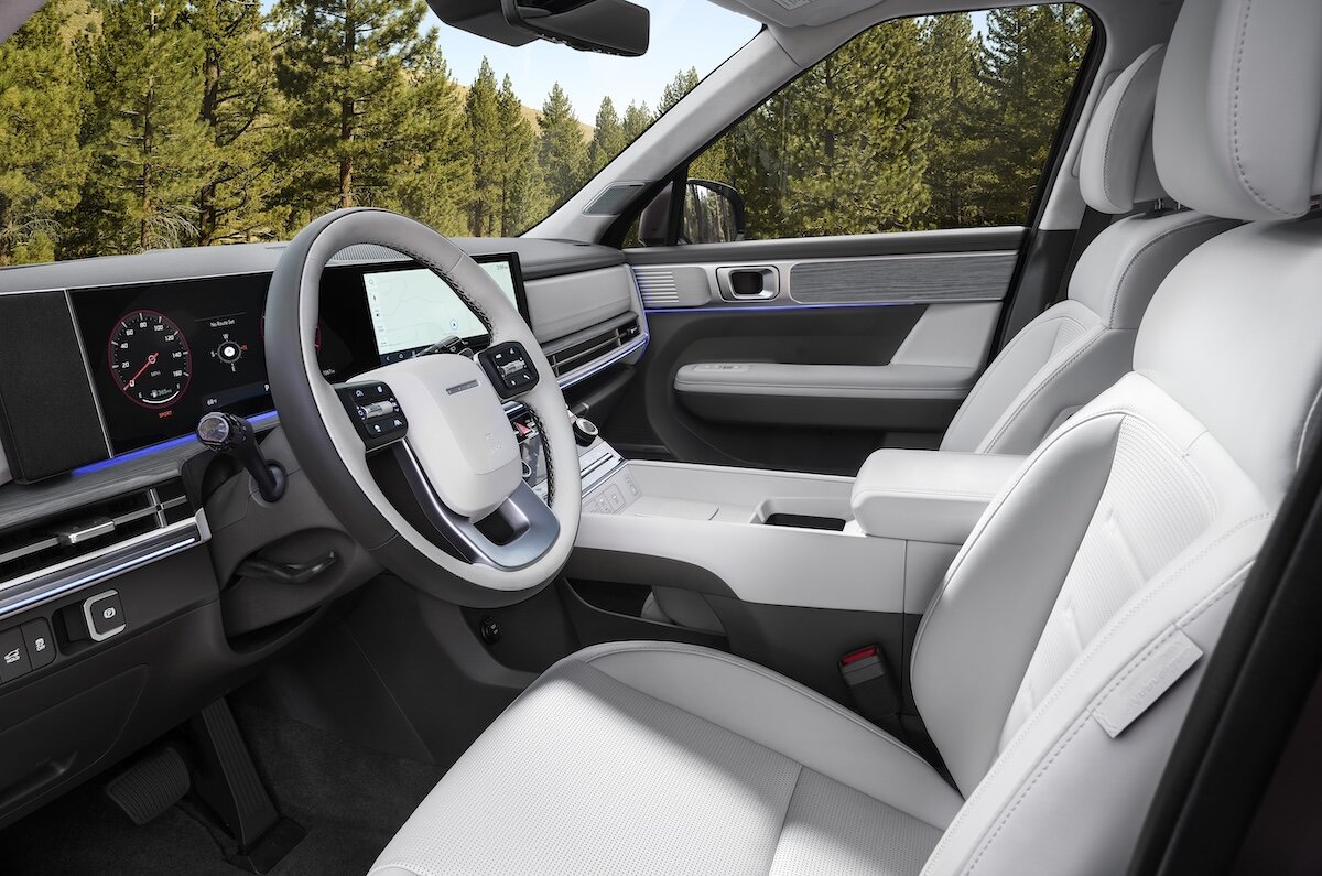 2027 Hyundai Santa Fe interior showing steering wheel and driver's seat