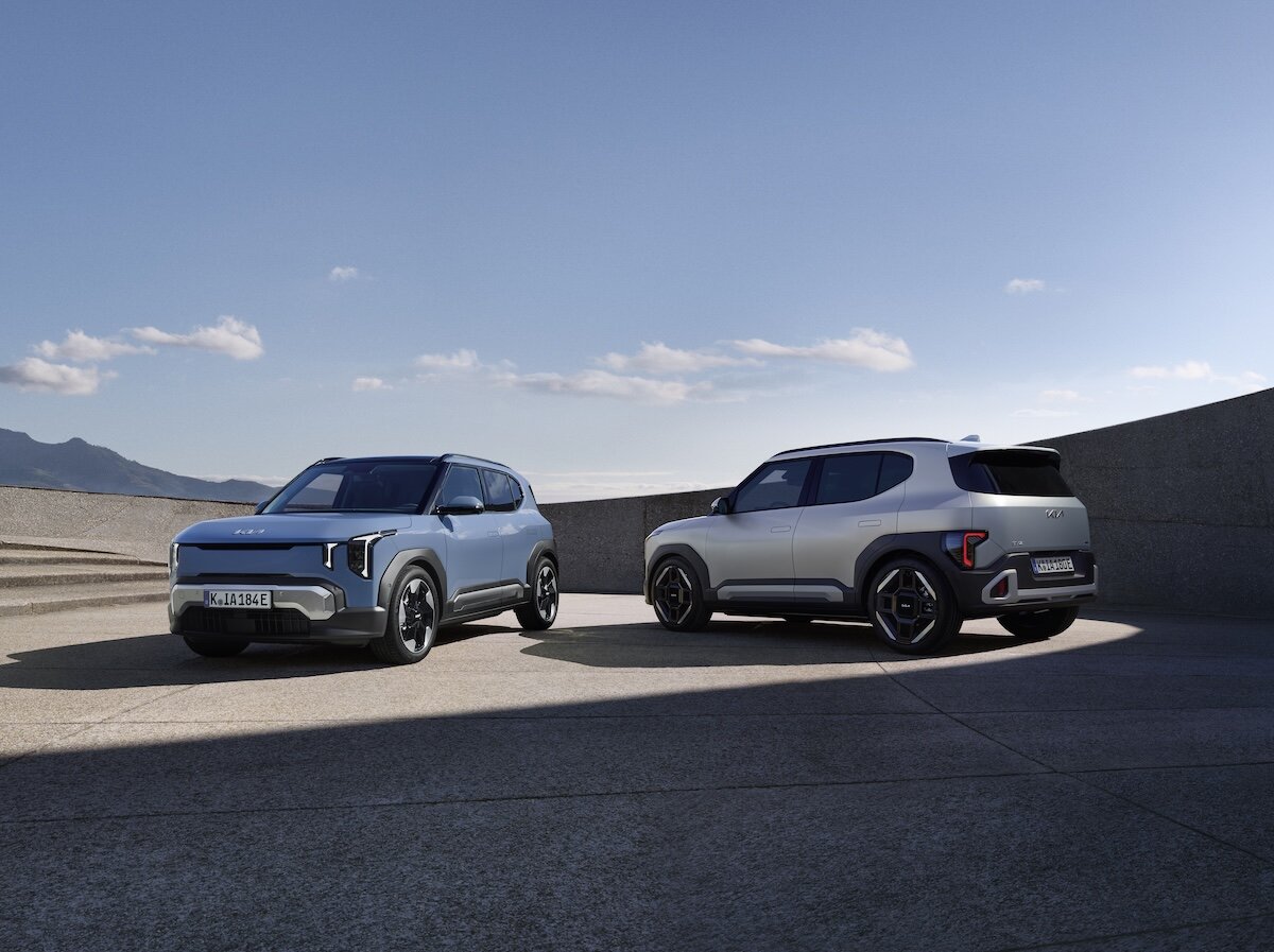 2026 Kia EV2 two cars parked showing front and rear styling