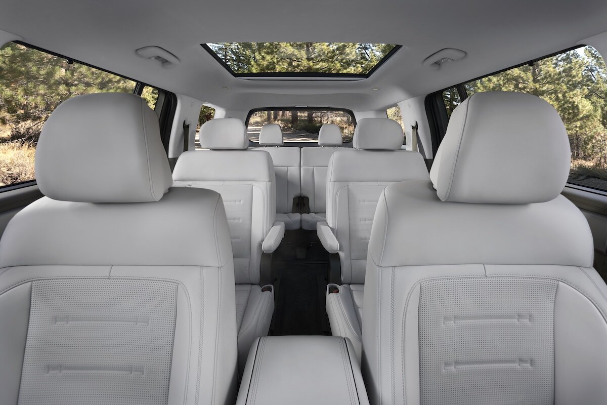 A car guru, happy to have purchased a car.