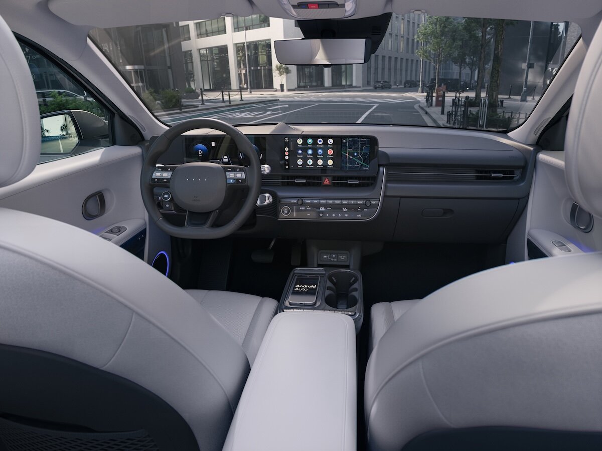 2026 Hyundai IONIQ 5 interior showing front seats, steering wheel, and dashboard
