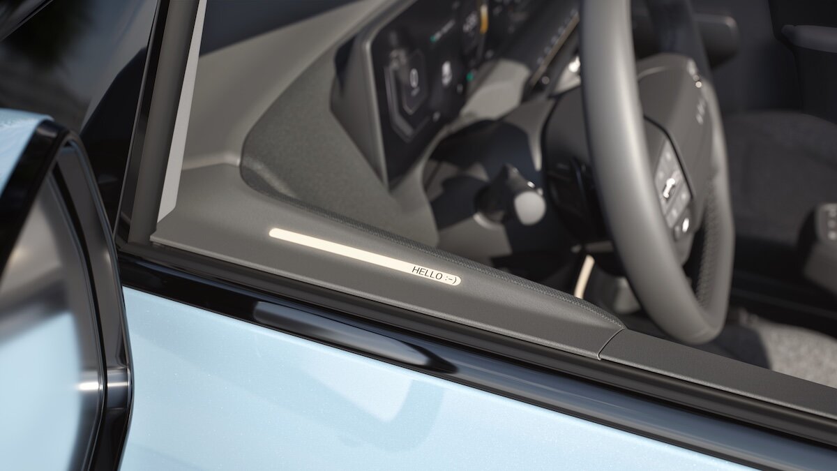2026 Kia EV2 detail downing hello message on door