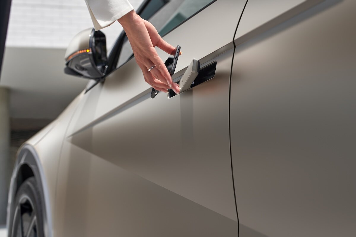 2026 Hyundai IONIQ 5 person unlocking car with Digital Key 2 Premium