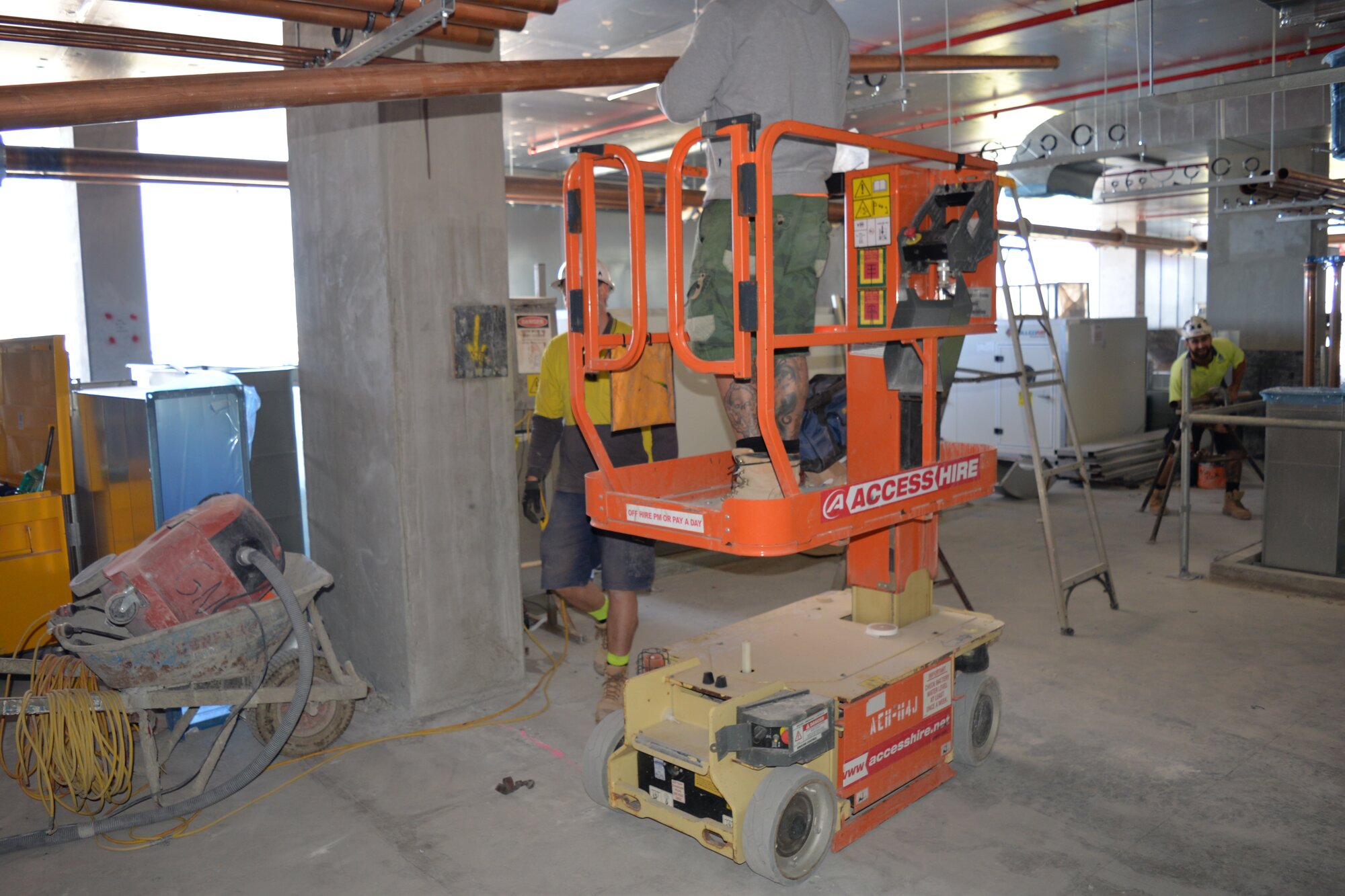 JLG vertical lift being used by contractors for indoor construction work at Crown Towers.