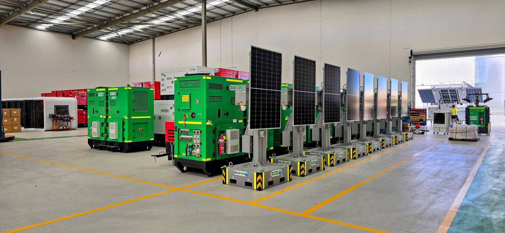 Globe Power generators and solar lighting towers inside the Canning Vale workshop.