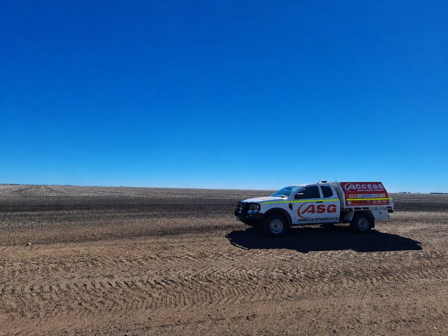 Access Service Group remote service vehicle in a remote Queensland location providing on-site equipment support.