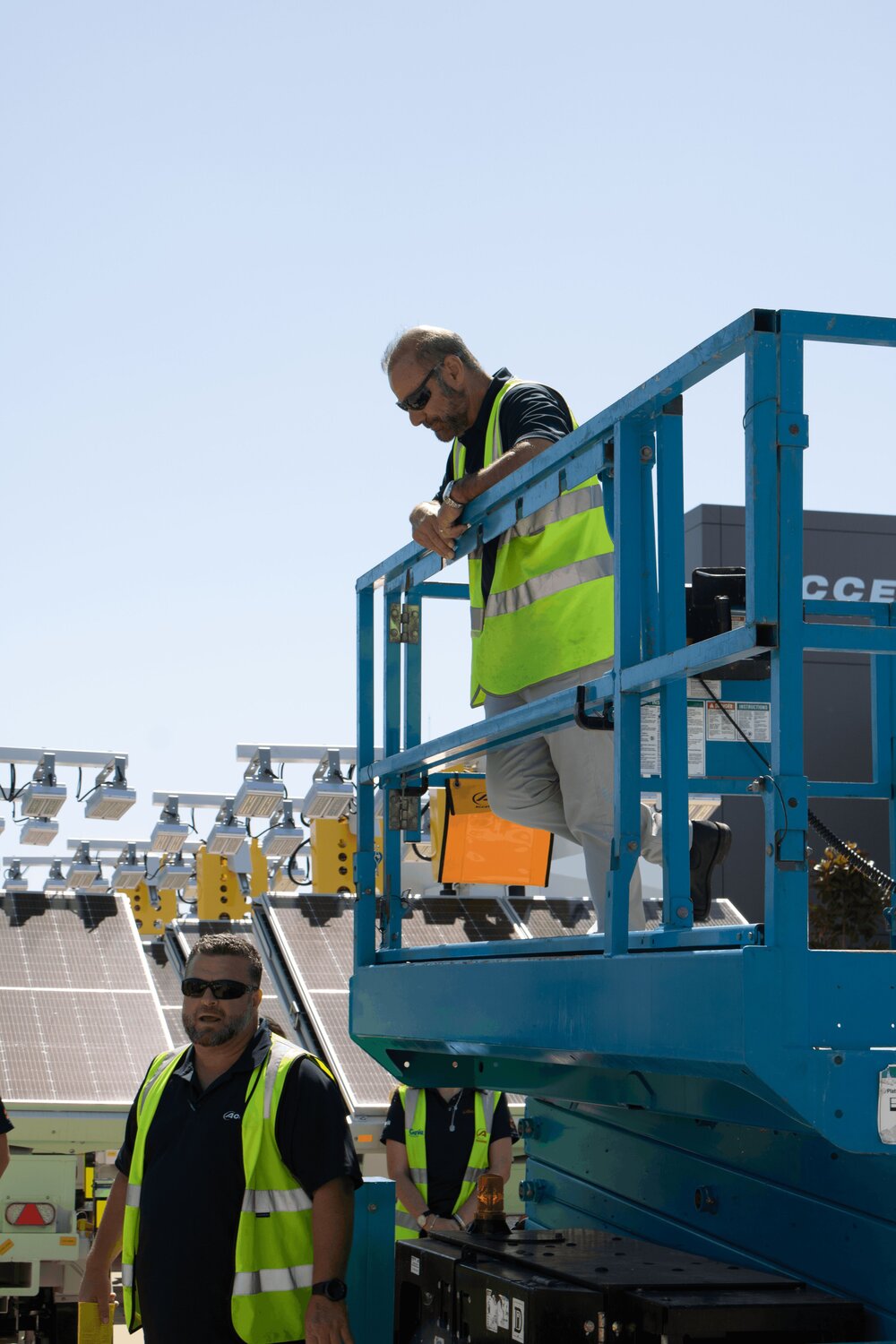 Instructor demonstrating the safe operation of a scissor lift during operator training at Access Hire's Canning Vale facility.