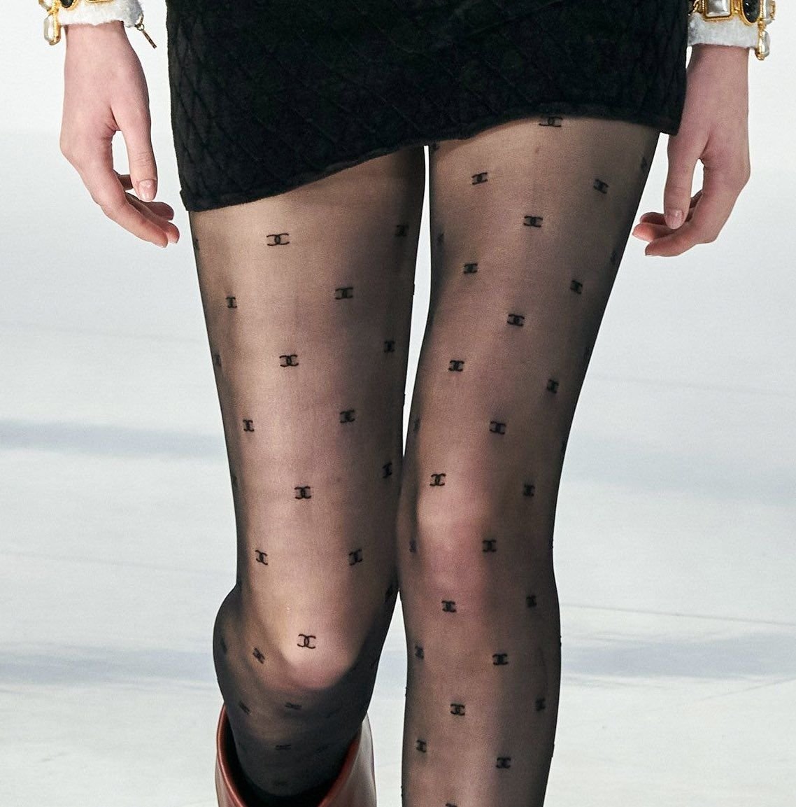 Close up of model wearing Chanel tights