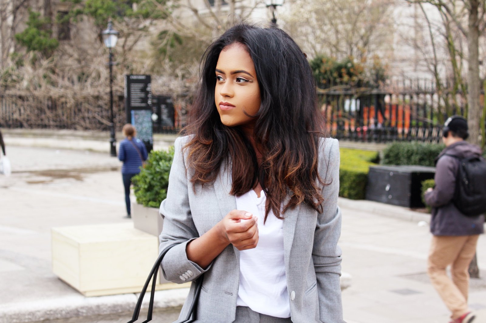 Close up of Sachini wearing a grey suit