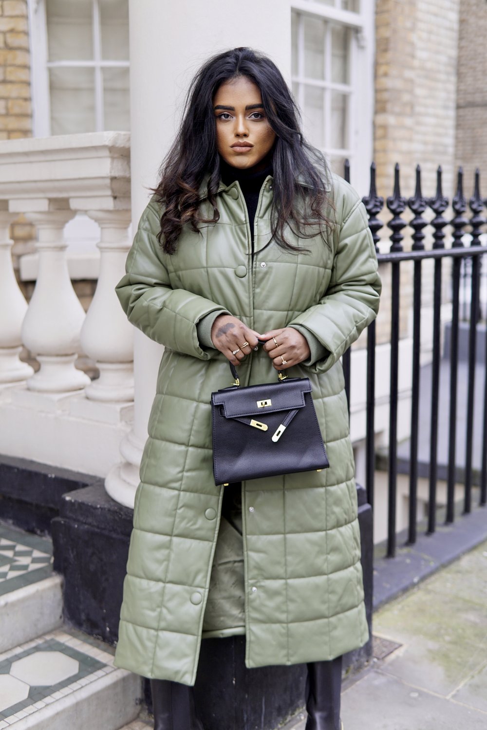 Sachini wearing River Island puffer coat