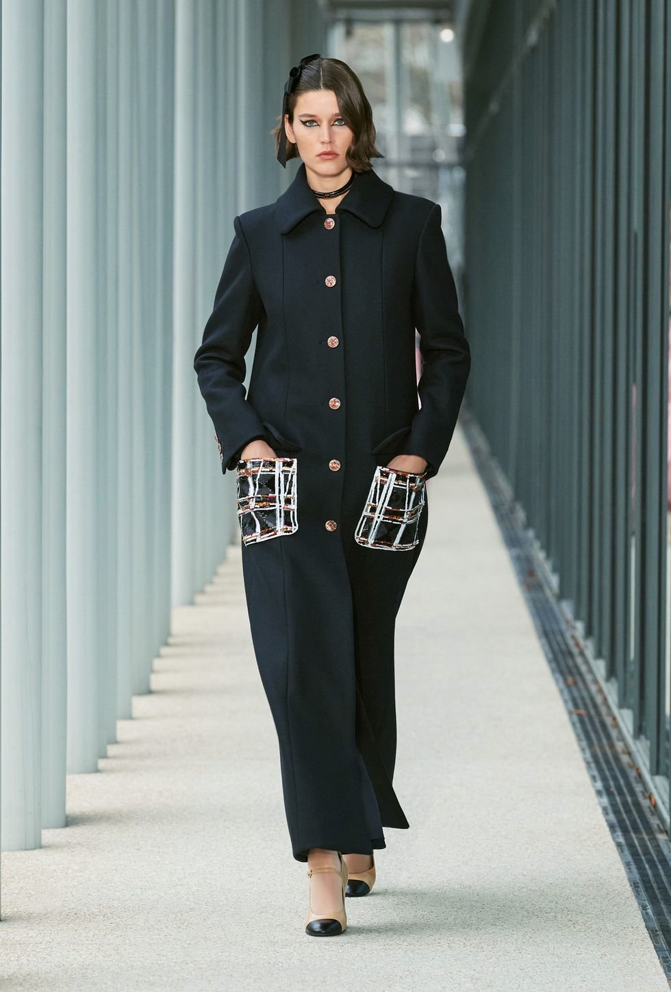 Model wearing Chanel Métiers d'art 2021/22 collection