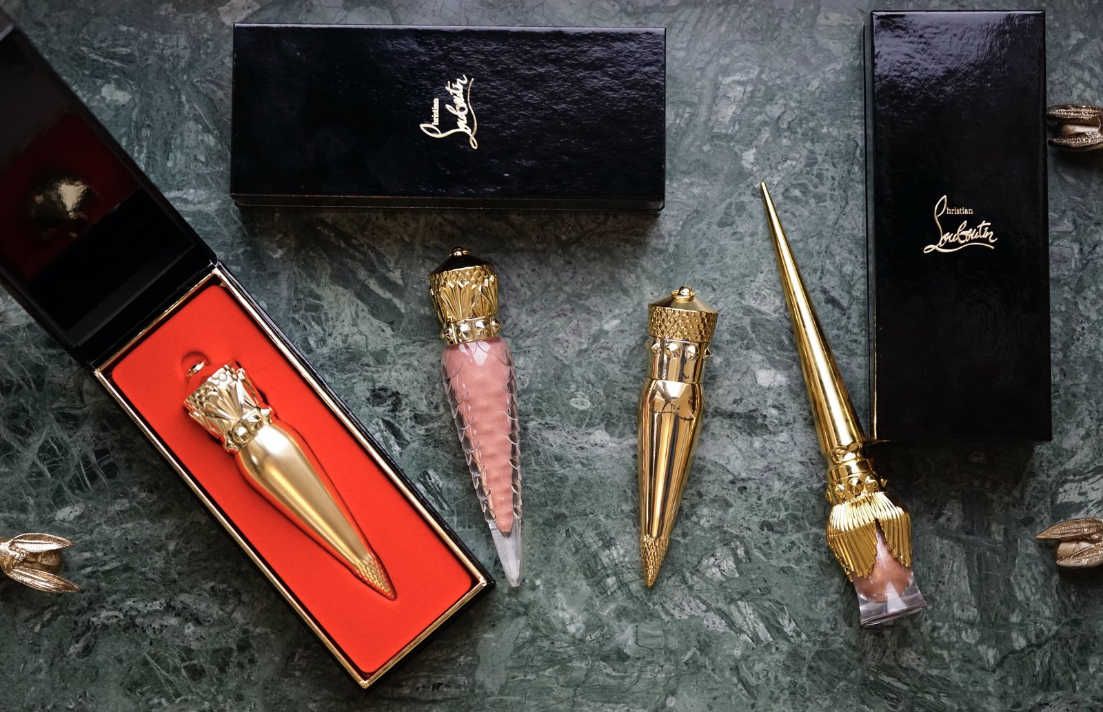 Shot of multiple Christian Louboutin beauty products