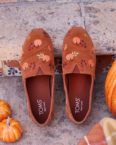 Women's Alpargata Classic in amber brown corduroy embroidered pumpkins shown.