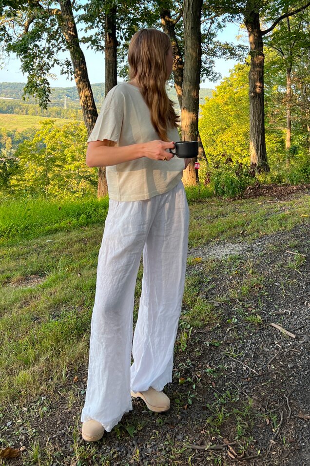 Model wearing women's Addison Clog Heel in deco natural shown.