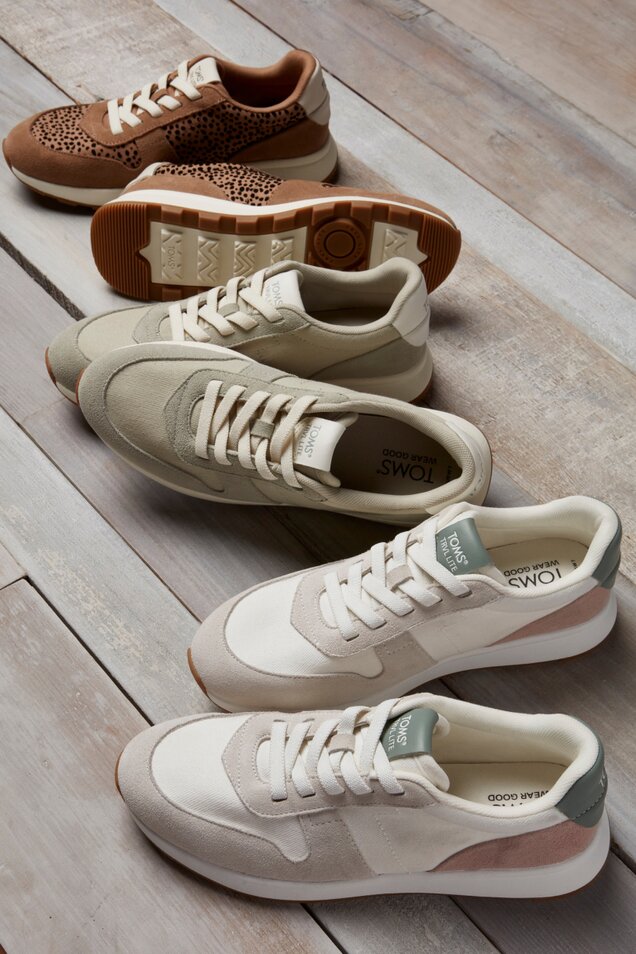 Women's TRVL LITE Retro Runner Sneakers in various colors shown.