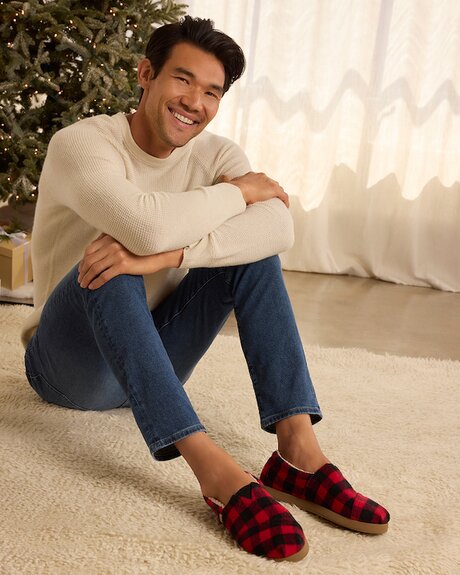 Model wearing men's Alp FWD in buffalo plaid red faux shearling shown.
