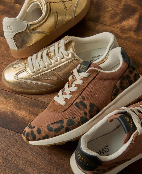 TRVL LITE Retro Runner Sneaker in various colors shown.