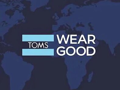 TOMS Wear Good logo on top of a map.