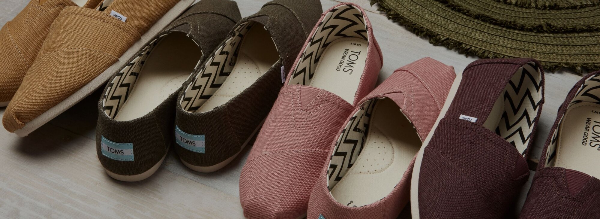 TOMS Wear Good logo and Alpargatas shown.