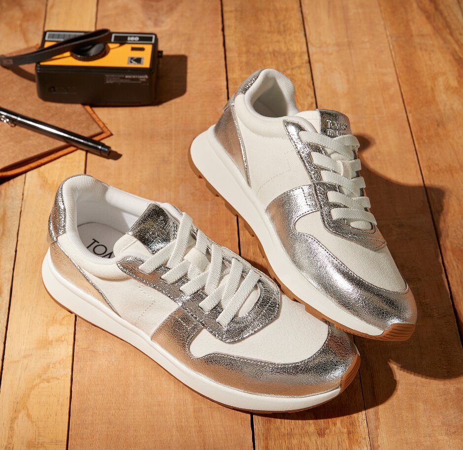 TRVL LITE Retro Runner Sneaker in Water Repellent Silver Crinkle Metallic Leather and Vintage Twill shown.