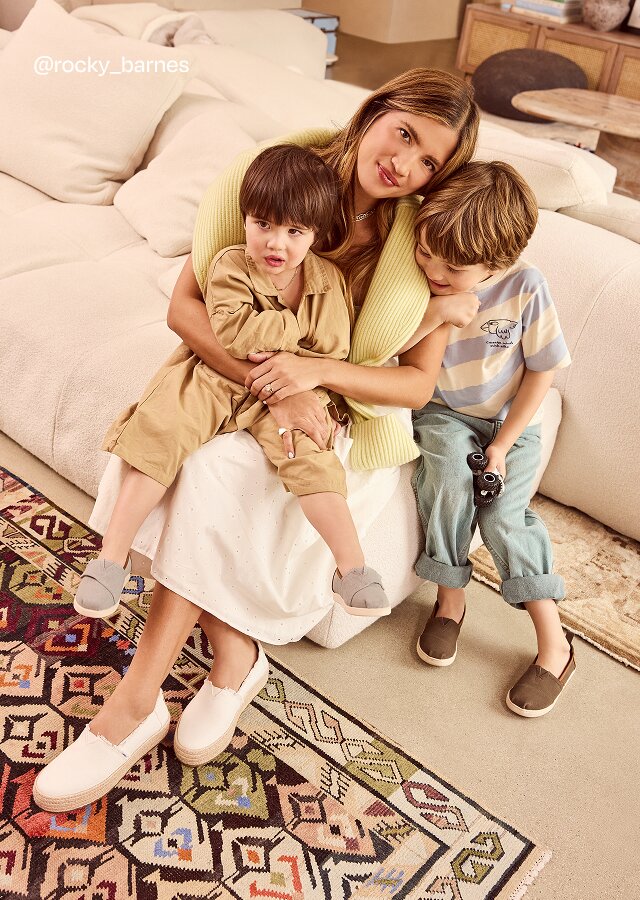 @rocky_barnes. Rocky wearing Valencia Platform Espadrille in White Canvas and sons wearing Alpargata Kids shoes in Canteen Green and Drizzle Grey Heritage Canvas.