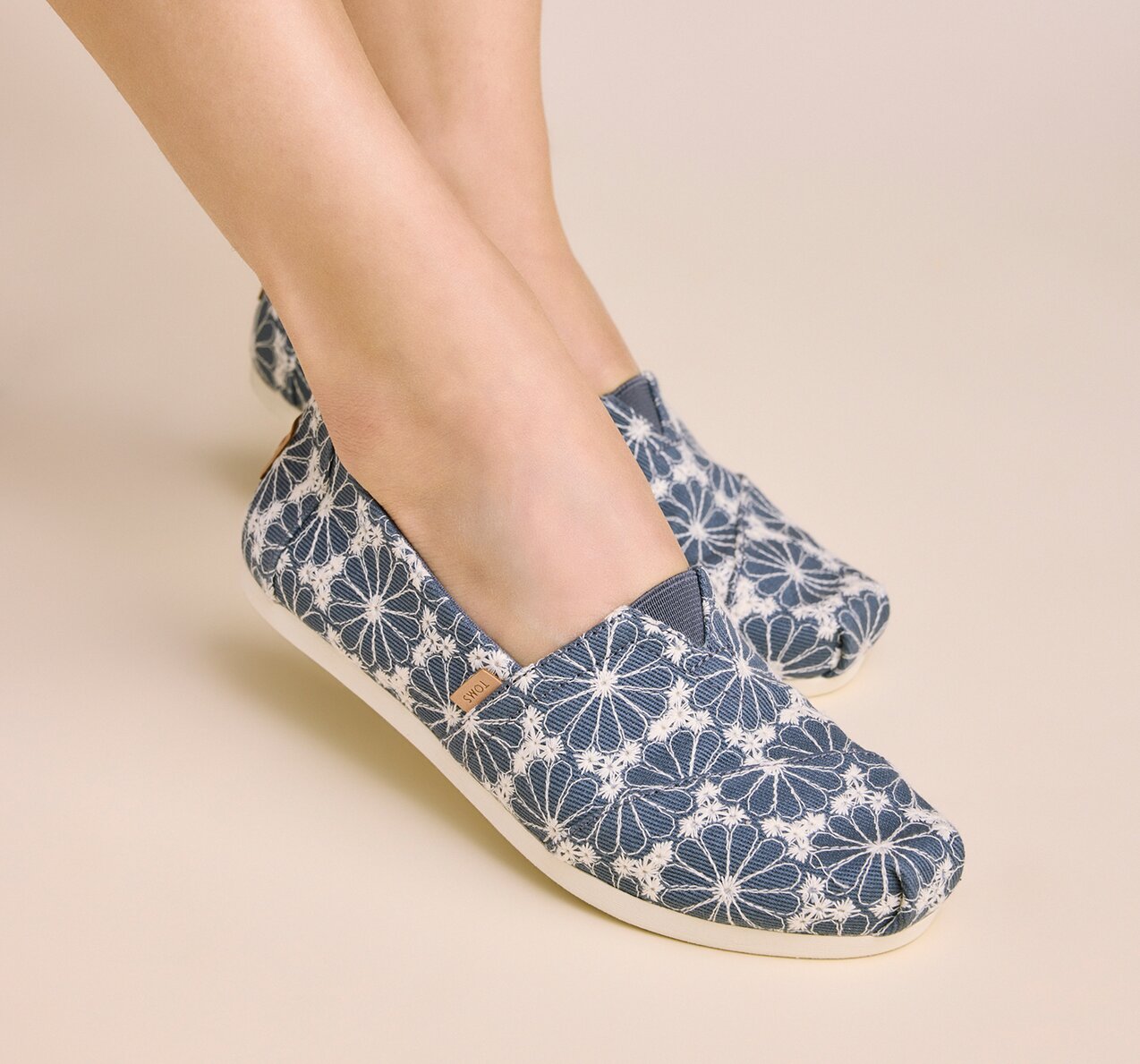 Women's Alpargata Classic in dark sky embroidered daisy denim​ shown.